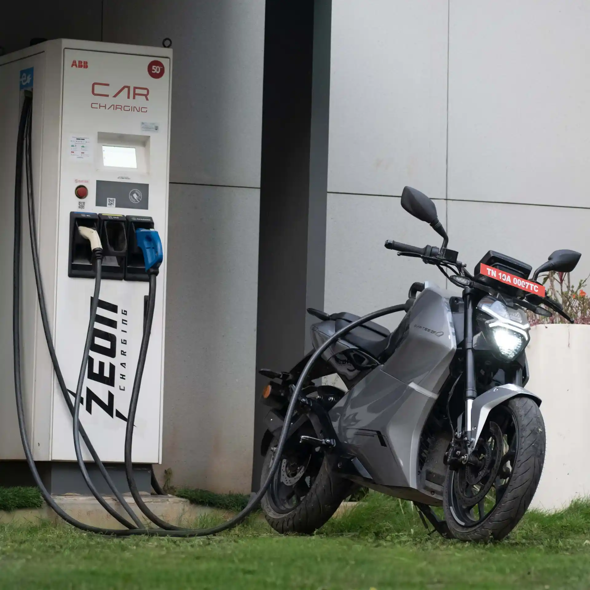 Raptee.HV T30 plugged into public CCS2 fast charger